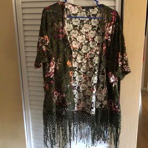 Green floral overlay with fringe